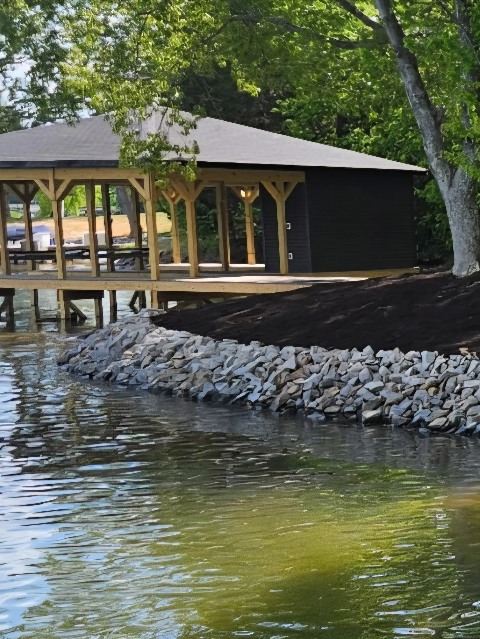 Professional repairing a seawall to ensure long-term shoreline protection