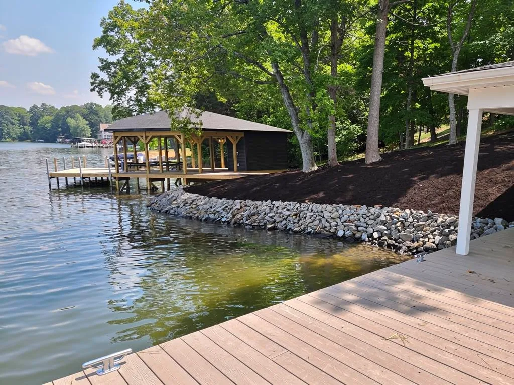 Crew stabilizing a Lake Anna shoreline ahead of seawall installation