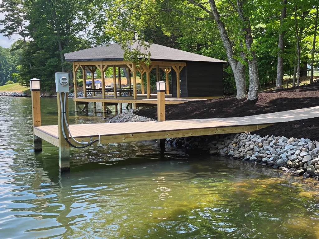 Close-up of dock wiring and GFCI outlet near waterline