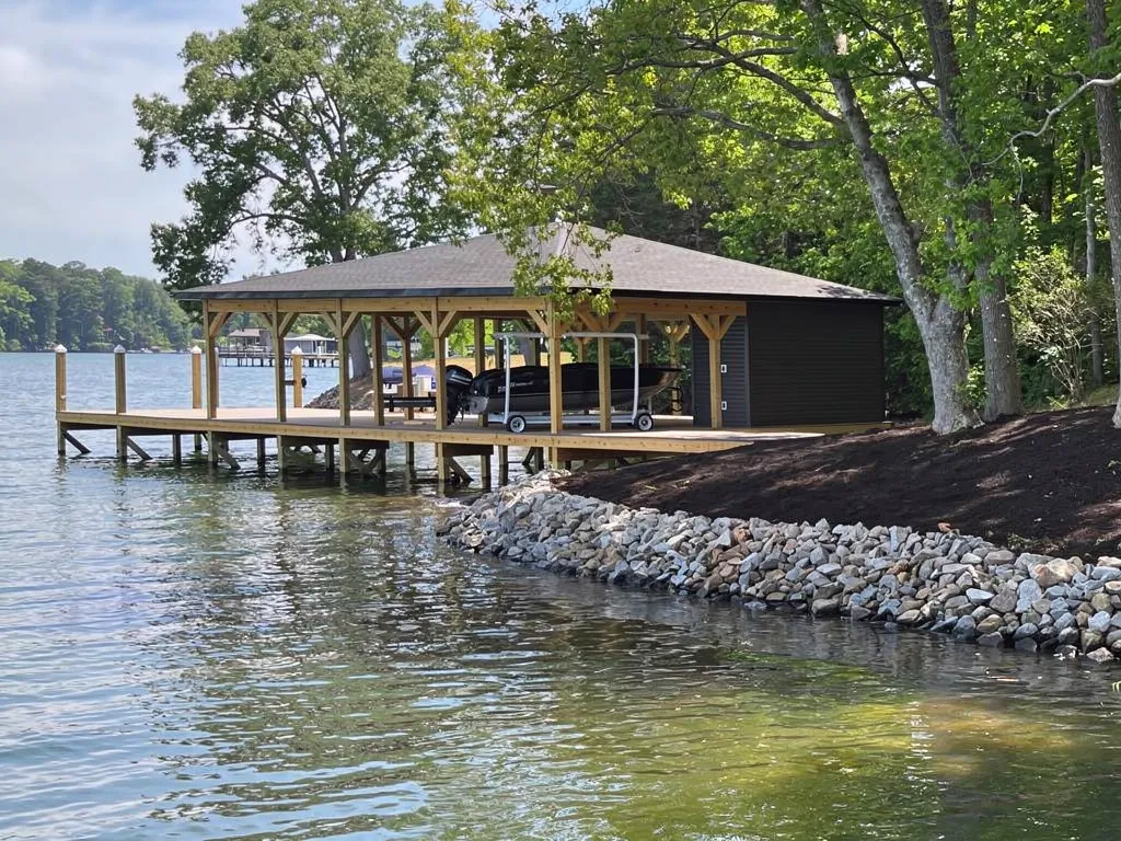 Multi-slip boathouse and boat lift on Lake Anna shoreline
