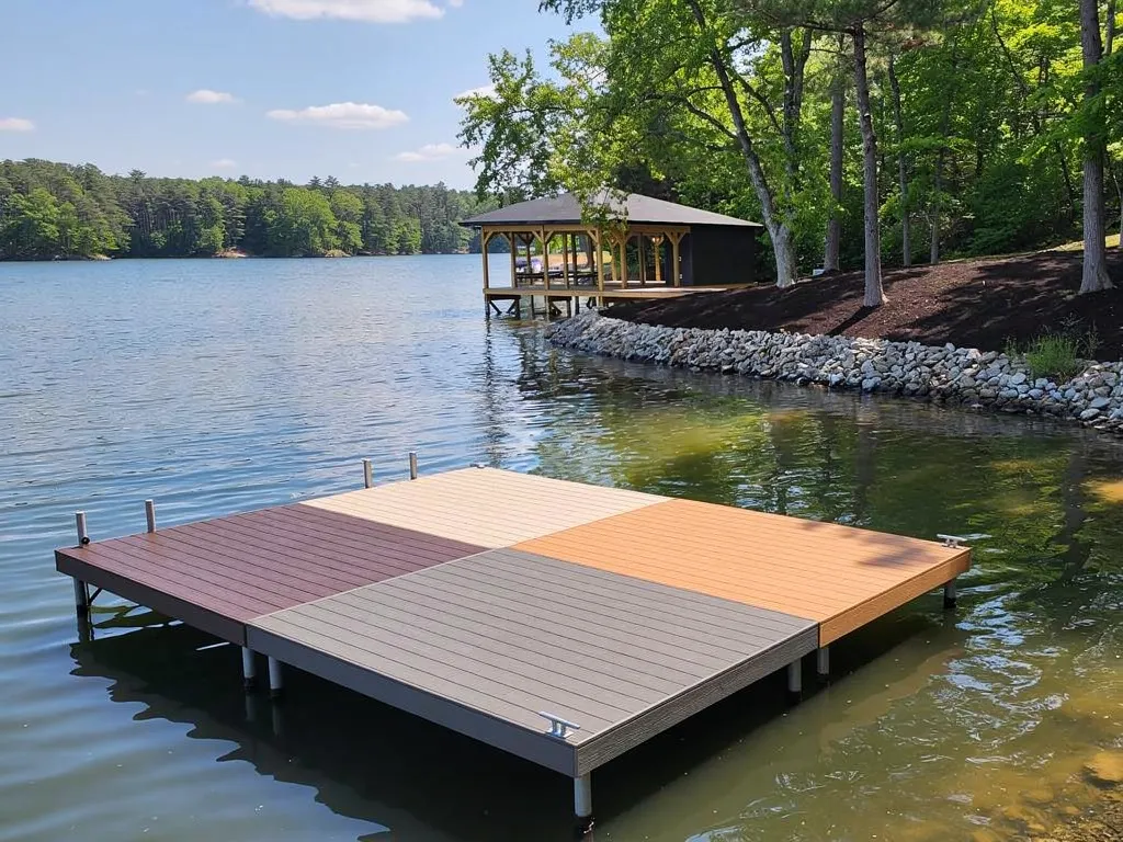 Four Trex decking samples in varying colors and finishes on display