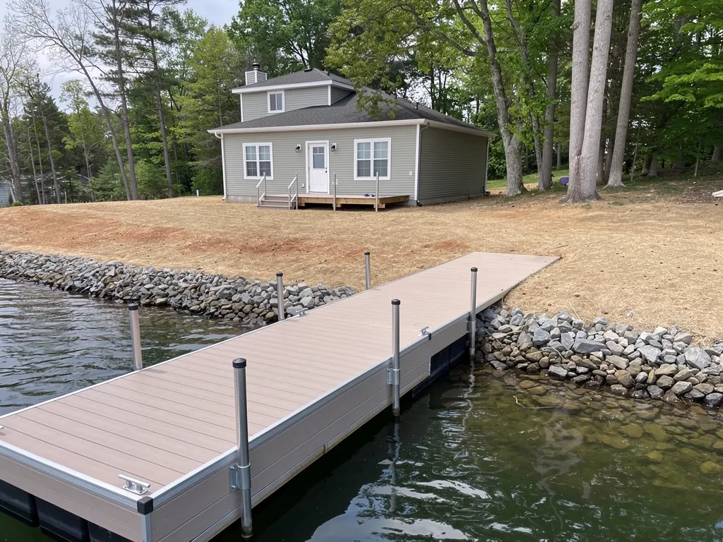 Boat dock at the shoreline with no adjacent seating or deck area