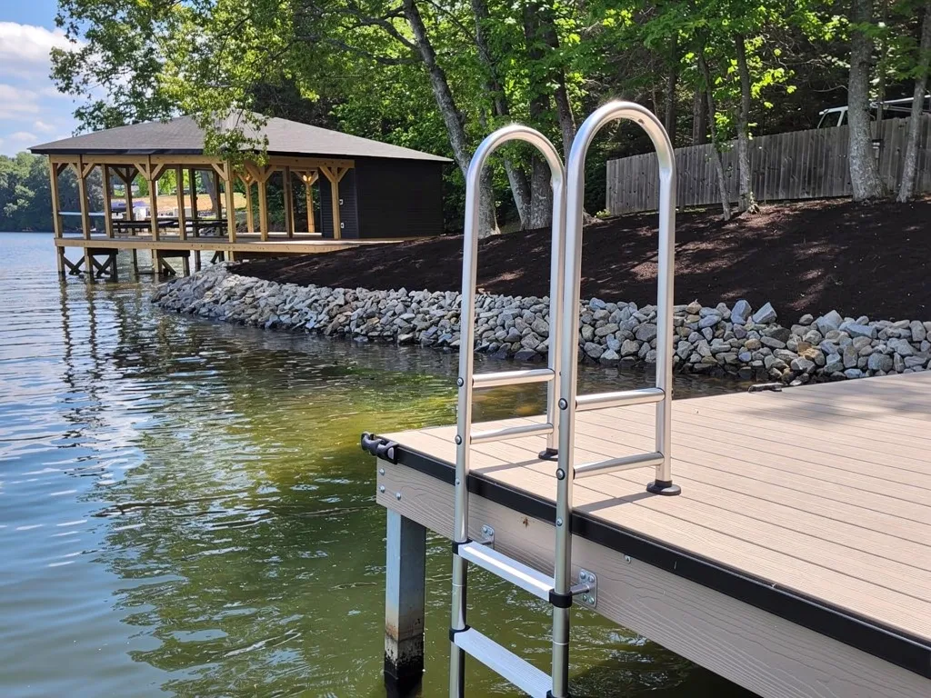 Aluminum and vinyl-coated steel dock ladders side by side